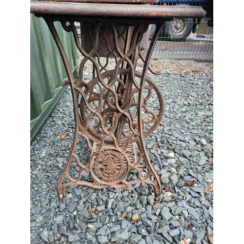 32 - An early 1900s singer sewing table.