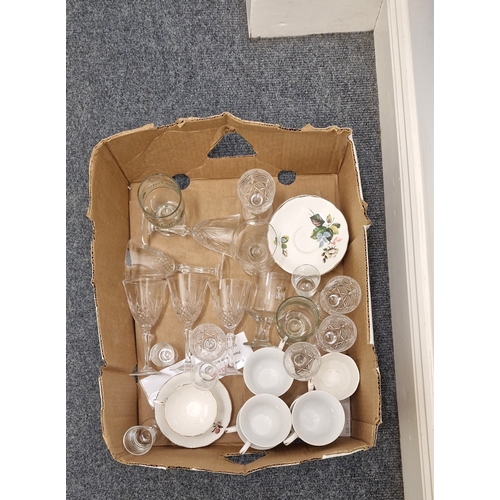 211 - A box of mixed glass ware