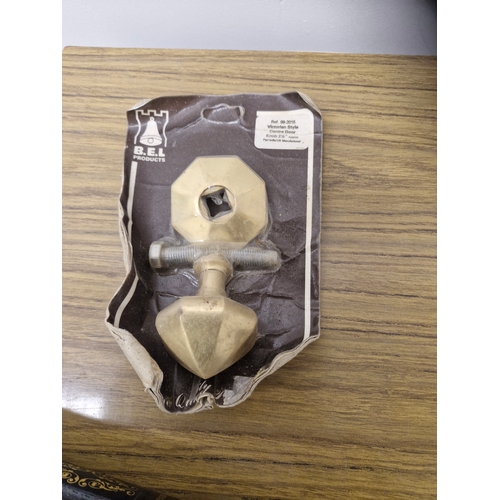 217 - A Victorian style brass door pull.