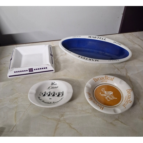 243 - A selection of 4 ash trays