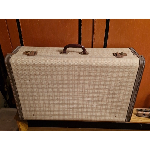 288 - A vintage suitcase.