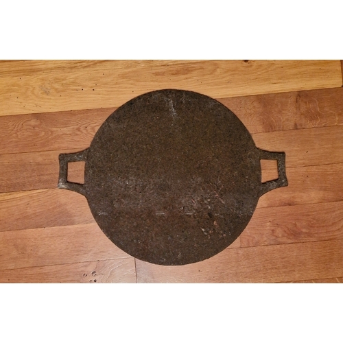 289 - A cast iron fire griddle