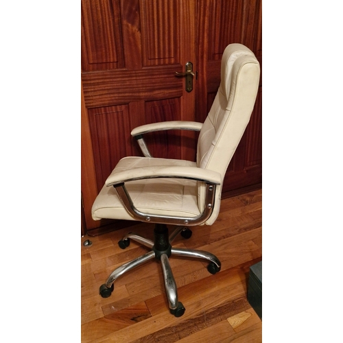 291 - A cream leather executive chair