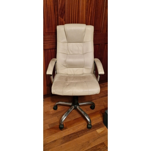 291 - A cream leather executive chair