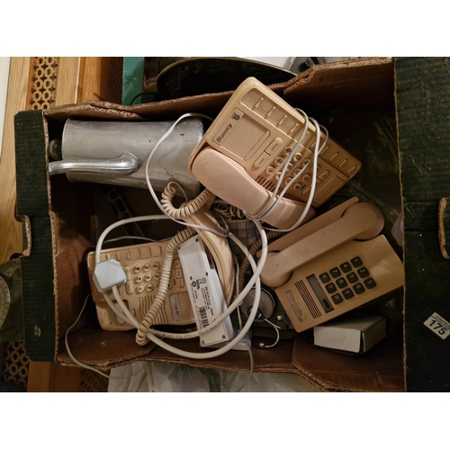 31 - Box of landline telephones.