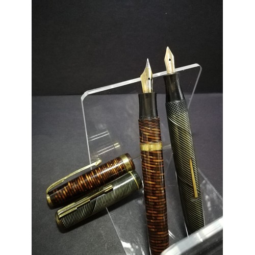 23 - 2 1930s fountain pens one with a 14ct nib