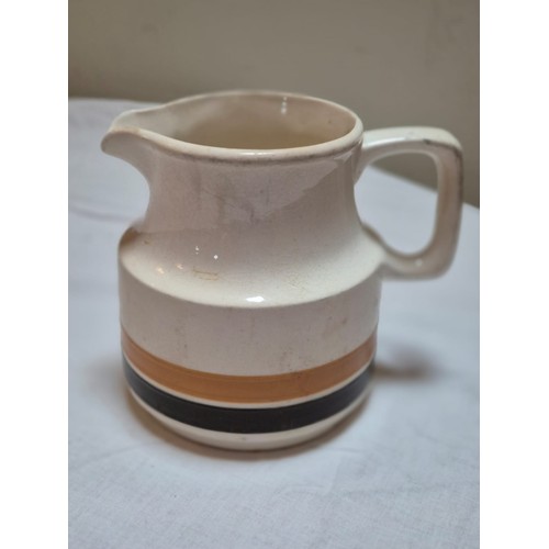 158 - Carrigaline Pottery 1 pint 'Autumn' stripe. Classic piece with age.