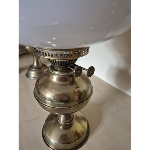 162 - Vintage brass oil lamp with wick mechanism. Glass chimney intact.