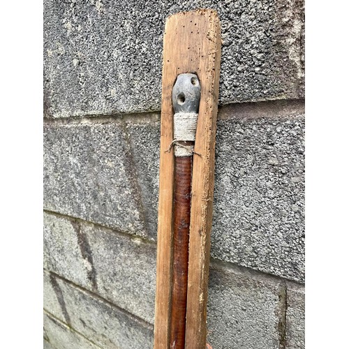 166 - Long leather clad pole in wooden case.