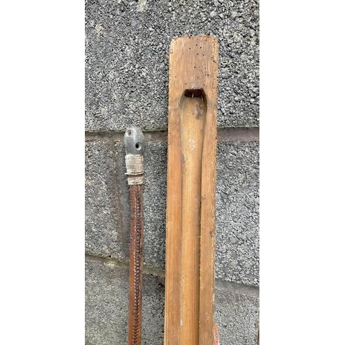 166 - Long leather clad pole in wooden case.