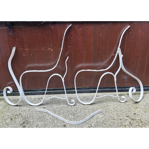 66 - A pair of Victorian strapwork iron bench ends