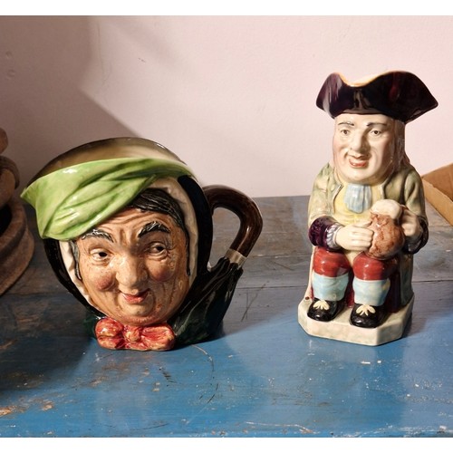 120 - Two Toby Jugs  -  one Beswick and the other Royal Doulton.