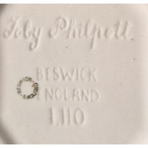 120 - Two Toby Jugs  -  one Beswick and the other Royal Doulton.