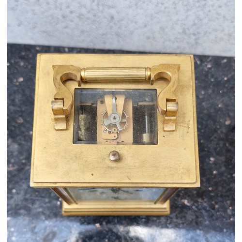 75 - French brass travel clocks with porcelain plaques