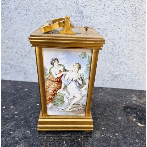 75 - French brass travel clocks with porcelain plaques