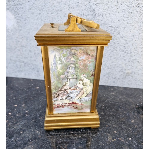 75 - French brass travel clocks with porcelain plaques