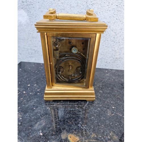 75 - French brass travel clocks with porcelain plaques