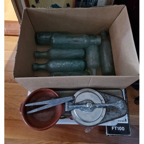 184 - Mixed items  -  torpedo bottles, a 1960s burger patty press bow and garlic crusher.