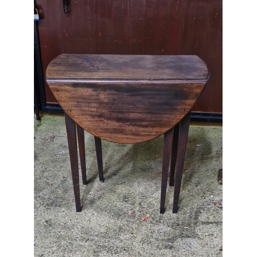 92 - Georgian mahogany drop-leaf Pembroke table. Oval hinged top with frieze drawer on square tapering le... 