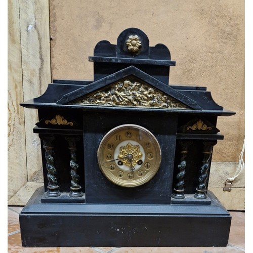 108 - A late 1800s Victorian marble mantle clock with brass accents.