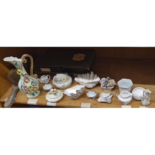 193 - A large selection of vintage items including two sea shells.