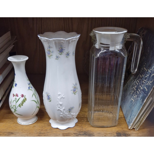 194 - Three decorative items to include a vintage water jug
