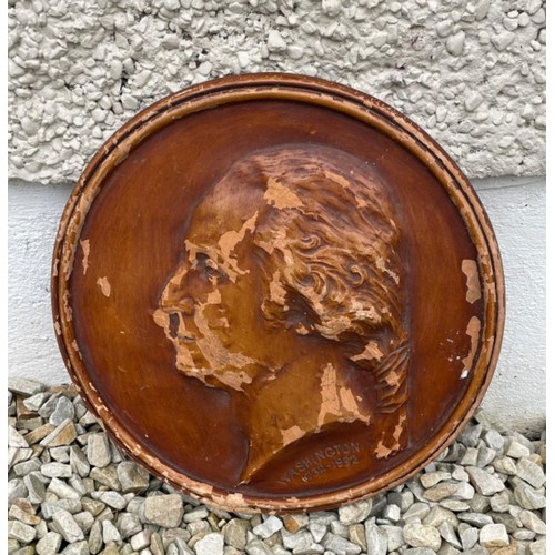 201 - A wooden decorative wall plaque of George Washington in a classical relief style.