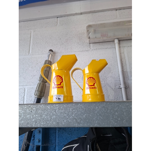 2 x Shell oil pourers