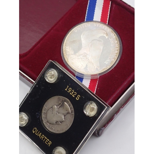 40 - A Quarter dated 1932s and an American silver one dollar coin dated 1984