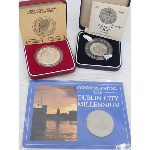 53 - A silver James Joyce medallion, a cupro nickel proof 50P coin, and a Dublin City Millennium medal