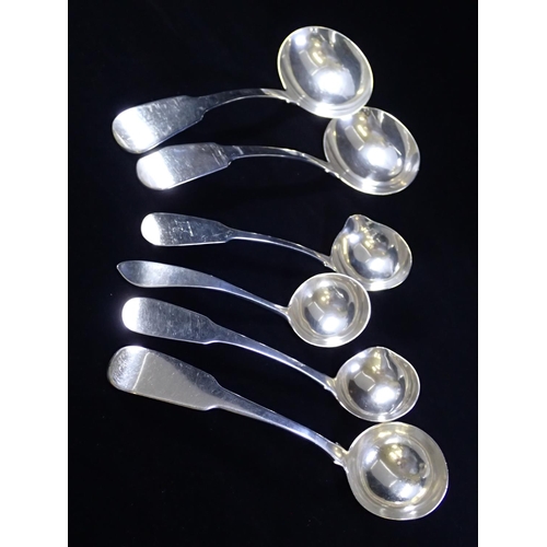181 - A collection of silver sauce ladles, total weight approx. 246 grams (5 Irish silver, 1 Glasgow 1910)