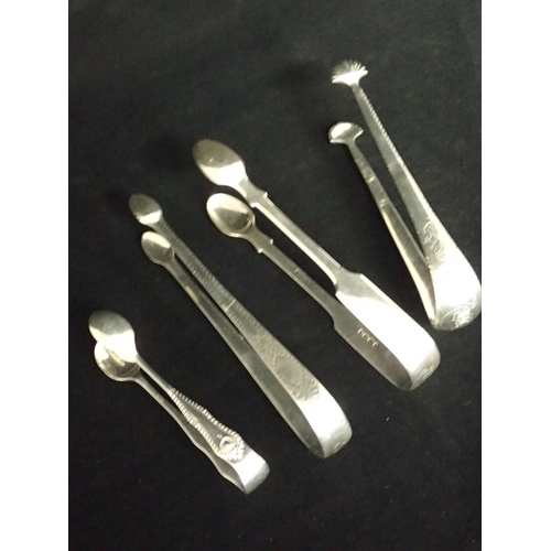 188 - A collection of four silver sugar tongs, (two are  Irish circa 1790's, total weight approx. 154 gram... 
