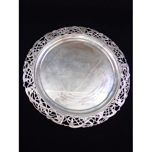 197 - An Irish silver salver decorated with a celtic style border approx. 880 grams by West & Son Dublin 1... 