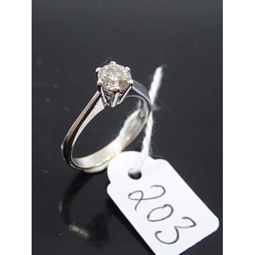 203 - A ladies 18ct white gold solitaire diamond ring finger size N