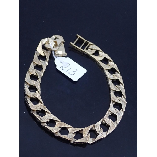 213 - A gold square link bracelet approx. 29.7 grams. approx 9 inches, (catch slight damage)