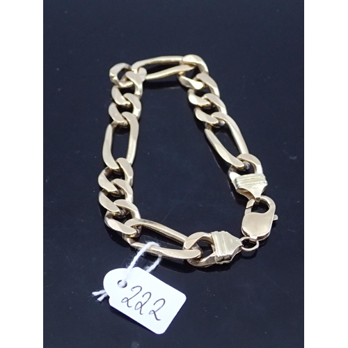 222 - A gold figaro bracelet approx. 35.5 grams, length just over 8.5 inches long
