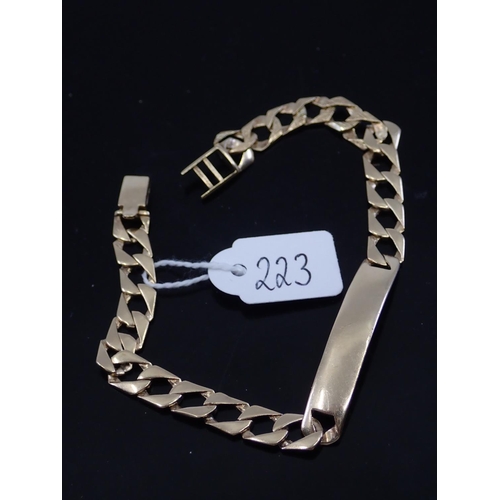 223 - A gold identity bracelet approx. 9.8 grams, lenght 7.5 inches