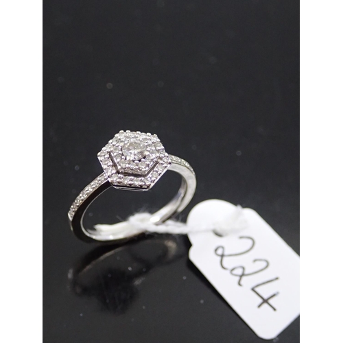 224 - A white gold cluster diamond ring finger size L