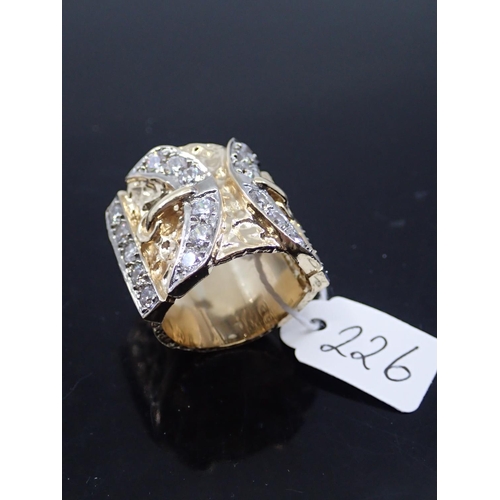226 - A gold buckle ring approx. 23 grams & finger size T