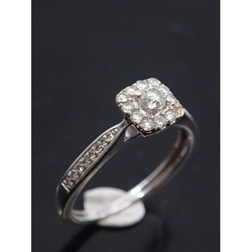 23 - A diamond cluster ring set in 9ct gold, total estimated weight of diamonds 0.25cts finger size I 1/2... 