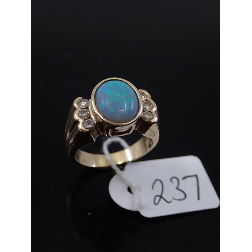 237 - A 14ct gold opal and diamond set ring approx. 8 grams, finger size L