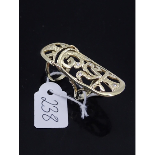 238 - A 14ct gold finger length ring, approx. 9.1 grams finger size J