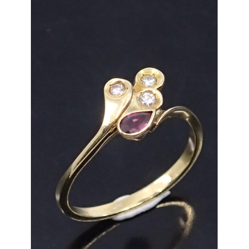 39 - A 14ct gold ruby and diamond cluster ring finger size M half