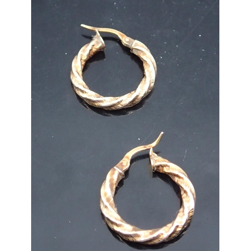 58 - A pair of 9ct gold hoop earrings approx. 1.2 grams