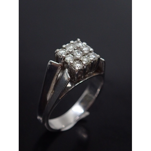 108 - A diamond cluster ring, set in 18ct gold approx. 5.4 grams, with a copy of a valuation which states ... 