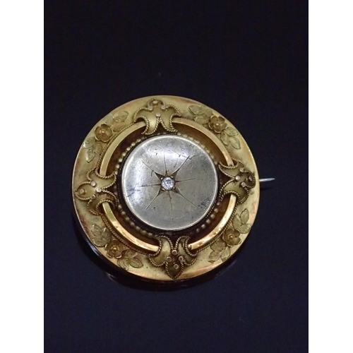 130 - A 15ct gold diamond set brooch, approx. 9.9 grams