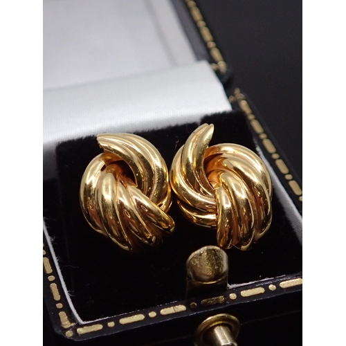 158 - A pair of gold knot earrings