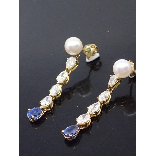 16 - A pair of pearl sapphire and diamond drop earrings