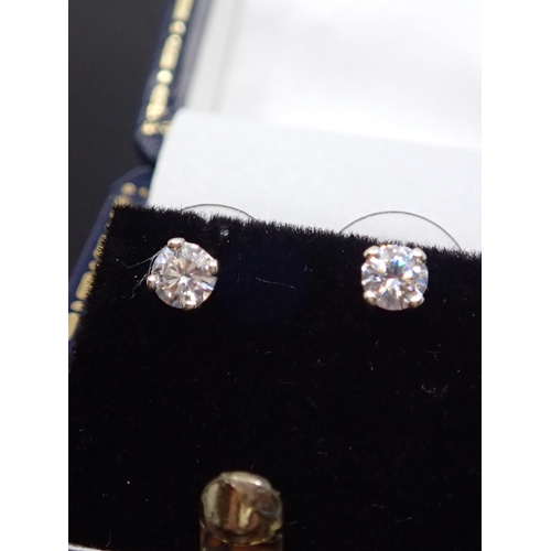 162 - Pair of 9ct gold diamond stud earrings