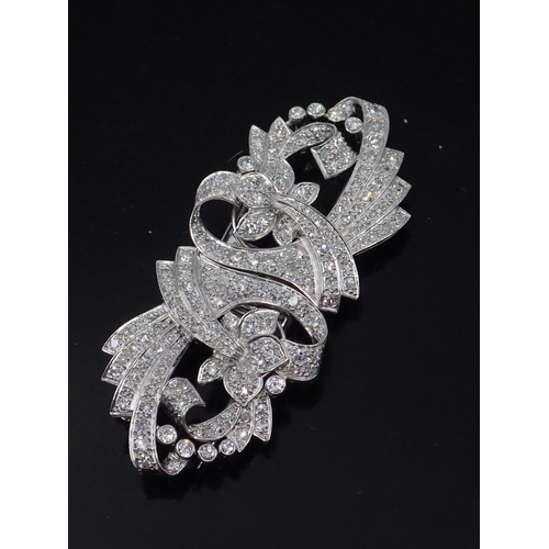 17 - A fine diamond double clip brooch set in platinum and 18ct gold  approx. 24.9 grams, total estimated... 